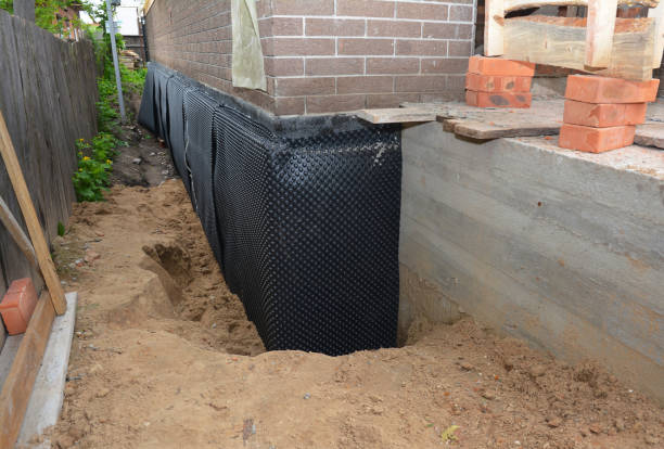 Happy homeowners after waterproofing job in Camillus
